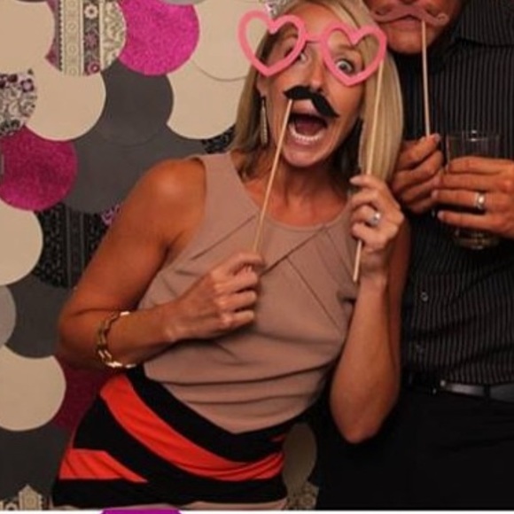 Tan bandage dress with bright orange and black waist detailing. - Picture 4 of 7